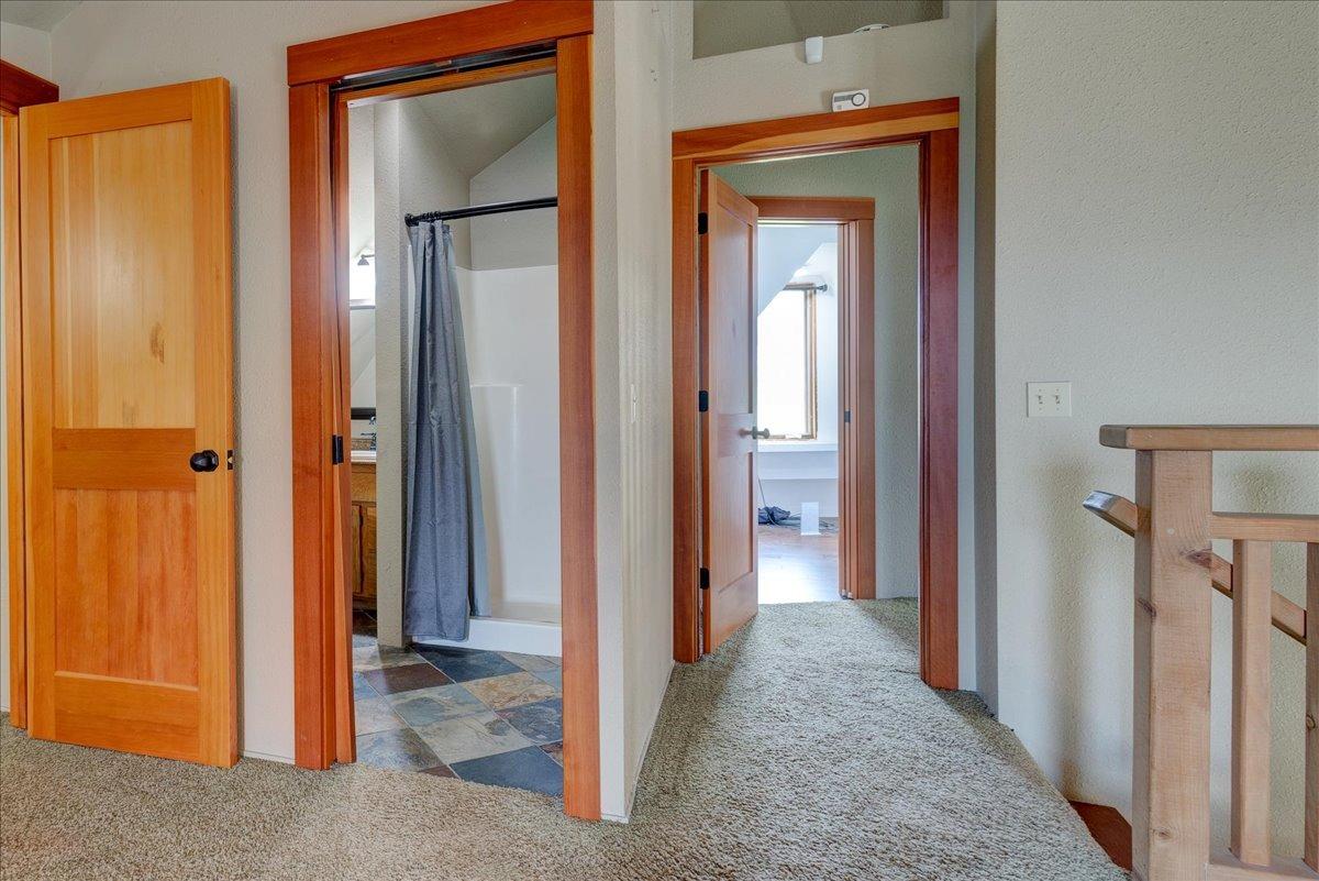 41622 Blue Oak Drive Springville, CA 93265 - Photo 32 of 68 a view of a hallway with a wooden door