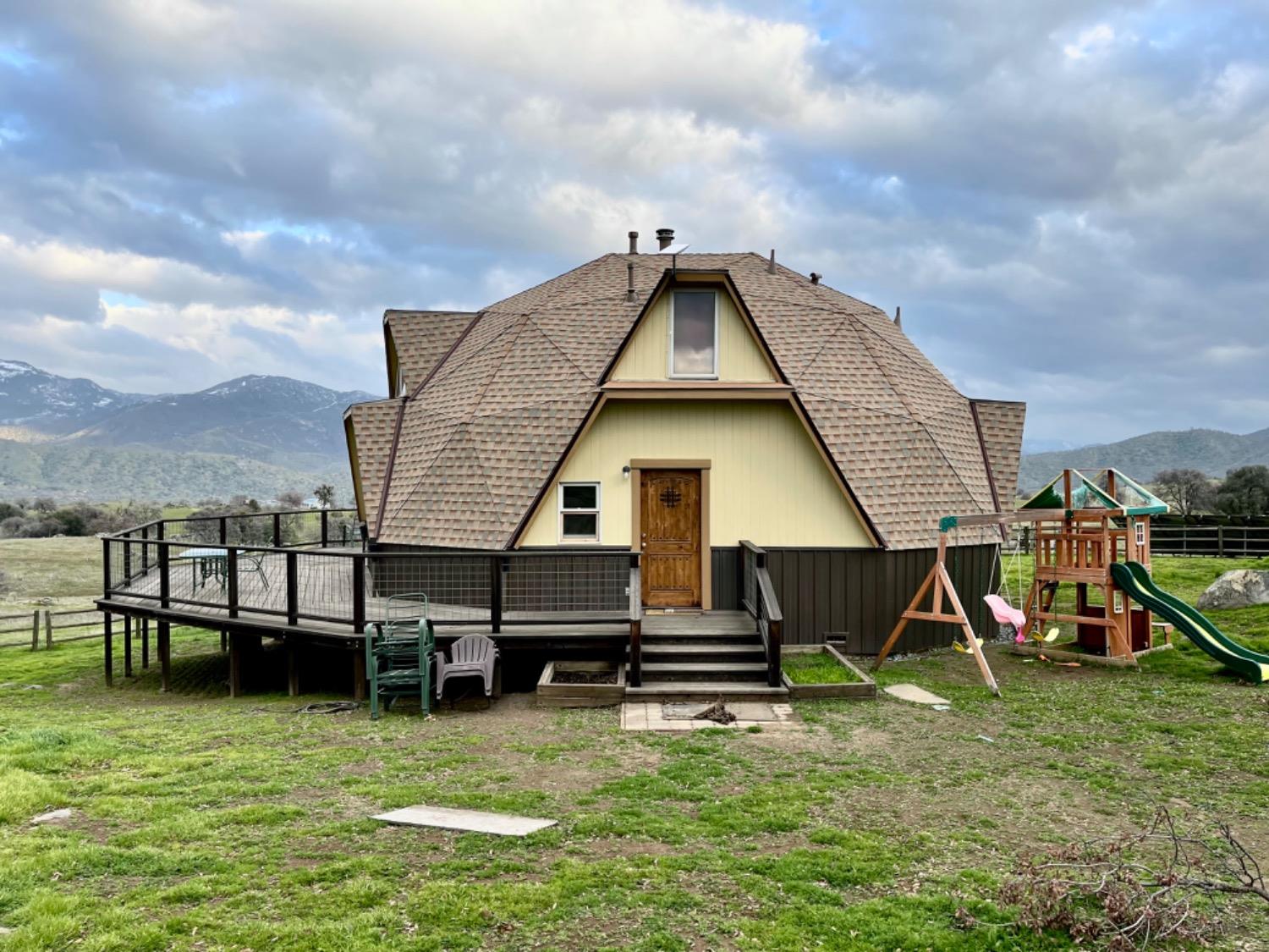41622 Blue Oak Drive Springville, CA 93265 - Photo 43 of 68 a view of a house with backyard porch and wooden fence