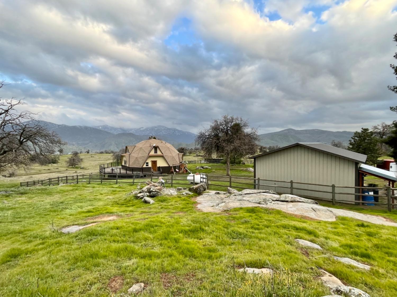 41622 Blue Oak Drive Springville, CA 93265 - Photo 44 of 68 a backyard of a house with table and chairs