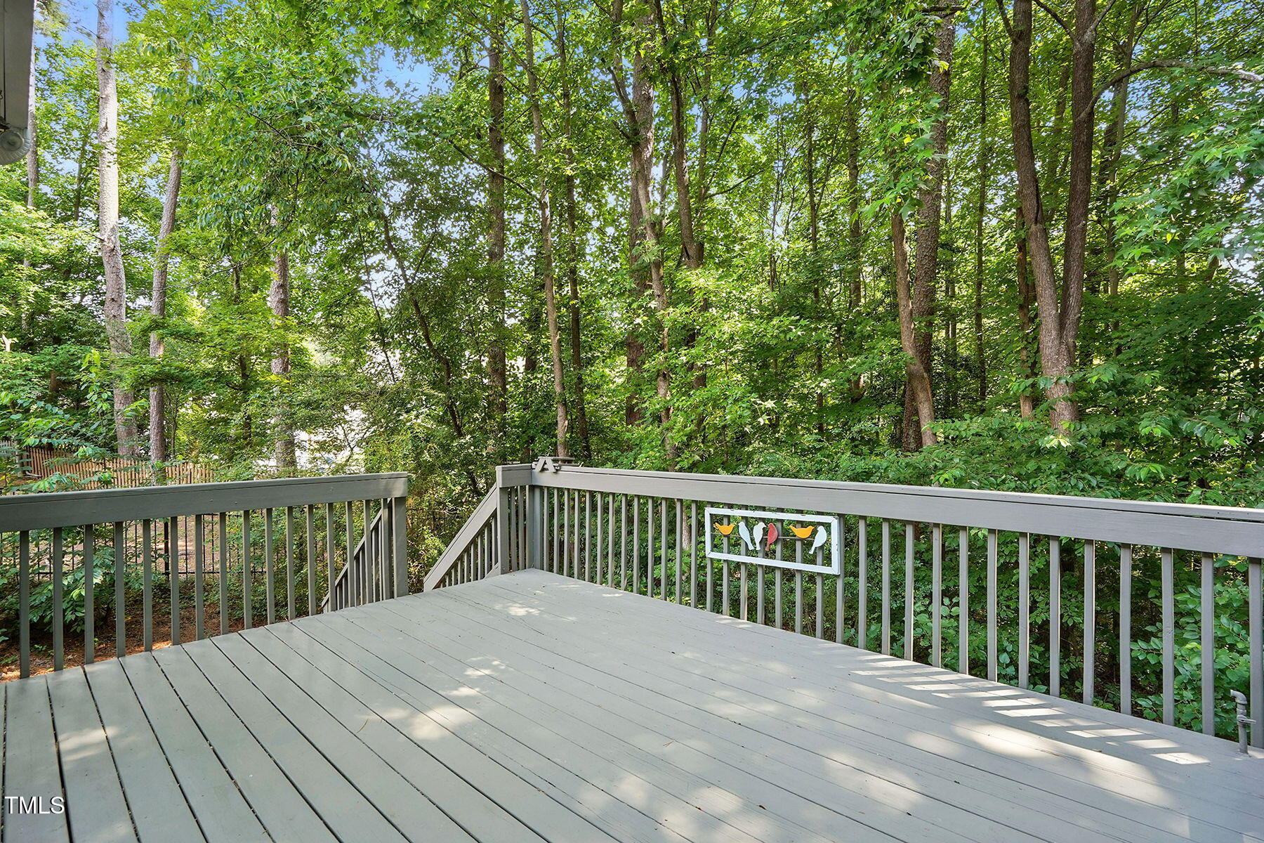 2425 Lemuel Drive Raleigh, NC 27615 - Photo 29 of 36 15x12 deck overlooks the beautiful wooded back yard.