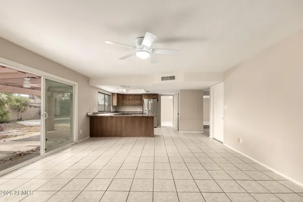 a view of a kitchen with a sink and a window