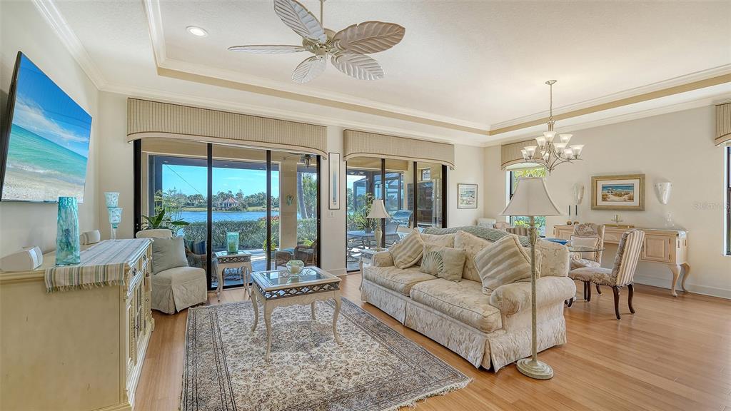 12759 Del Corso Loop Bradenton, FL 34211 - Photo 12 of 74 a living room with furniture and a large window