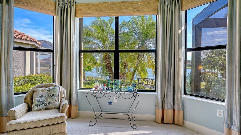 12759 Del Corso Loop Bradenton, FL 34211 - Photo 25 of 74 a living room with furniture and a window