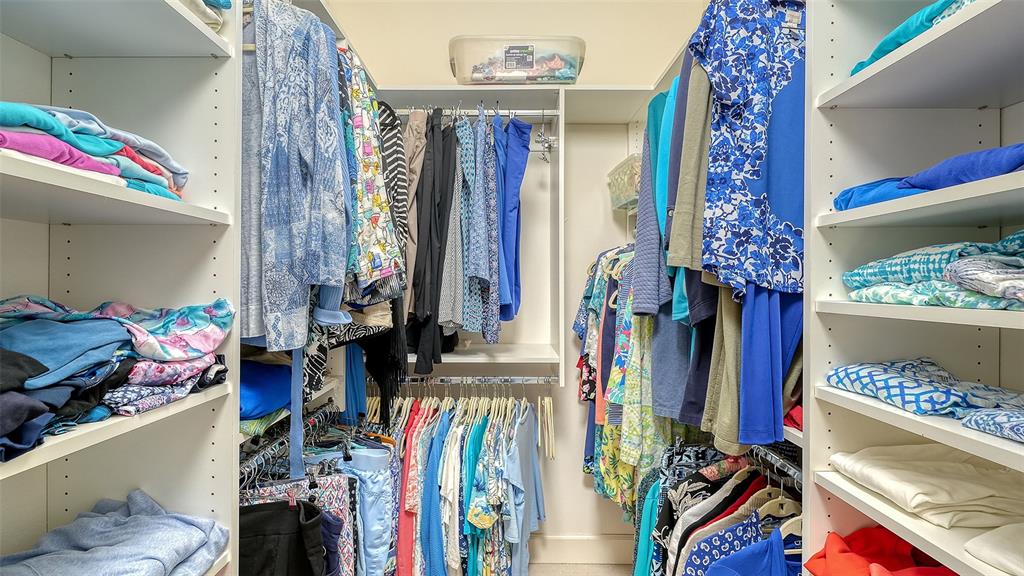 12759 Del Corso Loop Bradenton, FL 34211 - Photo 27 of 74 a view of walk in closet with clothes