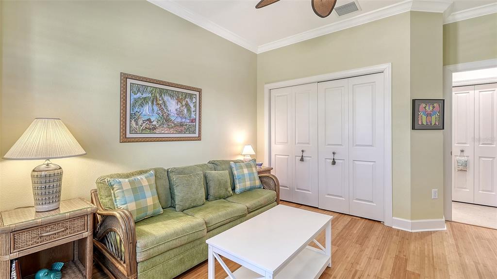 12759 Del Corso Loop Bradenton, FL 34211 - Photo 33 of 74 a living room with furniture and a wooden floor