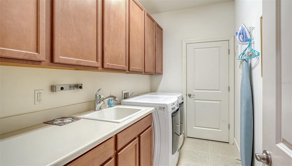12759 Del Corso Loop Bradenton, FL 34211 - Photo 37 of 74 a utility room with dryer and washer