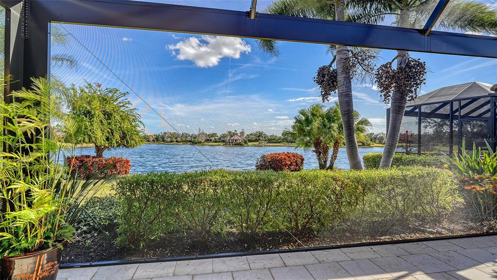 12759 Del Corso Loop Bradenton, FL 34211 - Photo 4 of 74 a view of a garden from a balcony