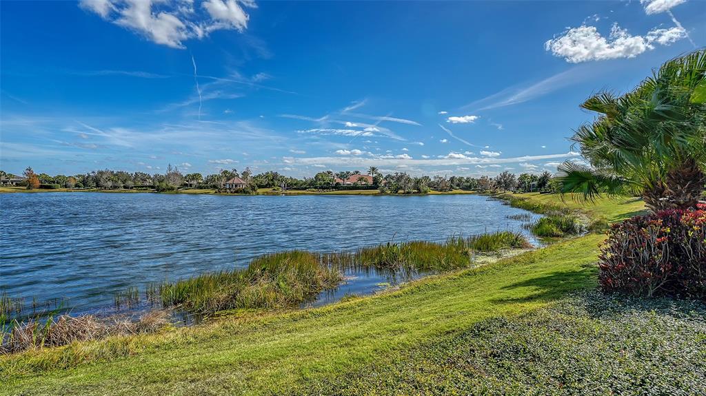 12759 Del Corso Loop Bradenton, FL 34211 - Photo 45 of 74 a view of a lake with houses in the back