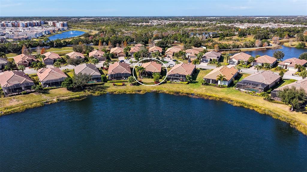 12759 Del Corso Loop Bradenton, FL 34211 - Photo 51 of 74 an aerial view of residential houses with outdoor space and river