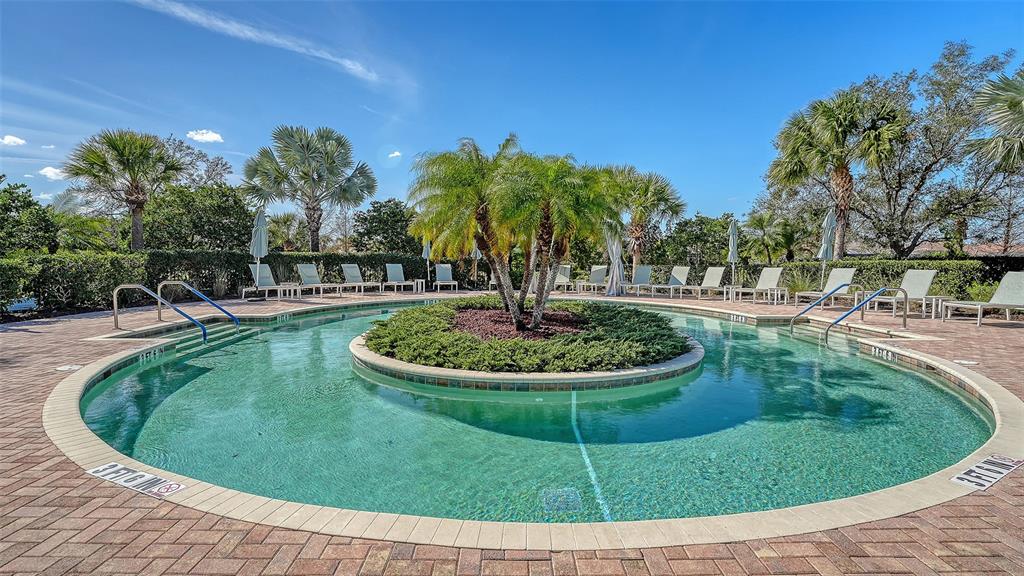 12759 Del Corso Loop Bradenton, FL 34211 - Photo 58 of 74 a view of a swimming pool with a patio