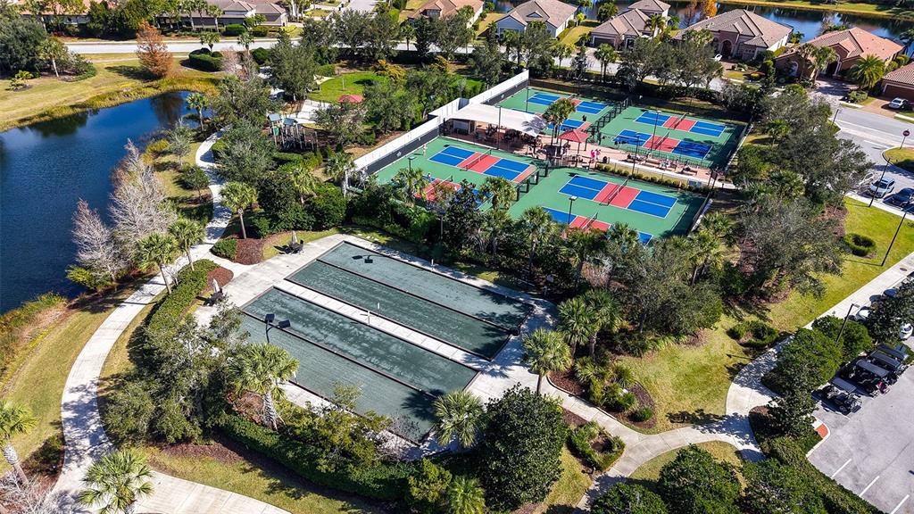 12759 Del Corso Loop Bradenton, FL 34211 - Photo 72 of 74 an aerial view of a residential houses with outdoor space and street view