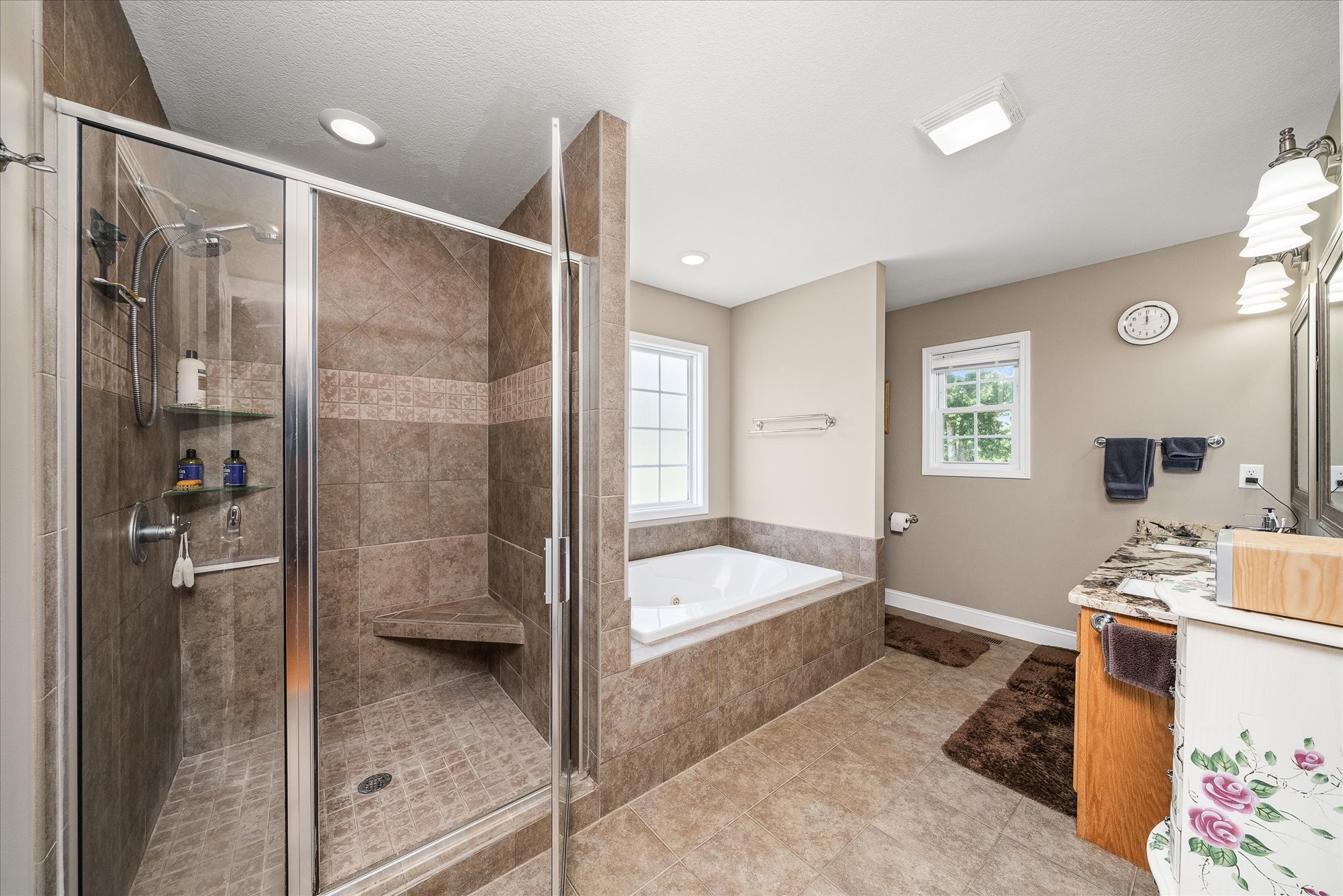 125 Clarence Lee Road Lancing, TN 37770 - Photo 12 of 55 a bathroom with a tub sink and shower