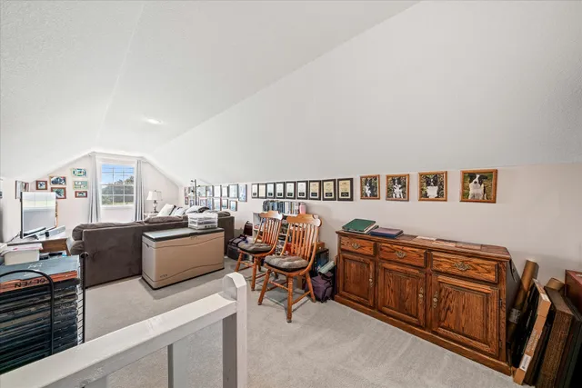 a view of a workspace with furniture