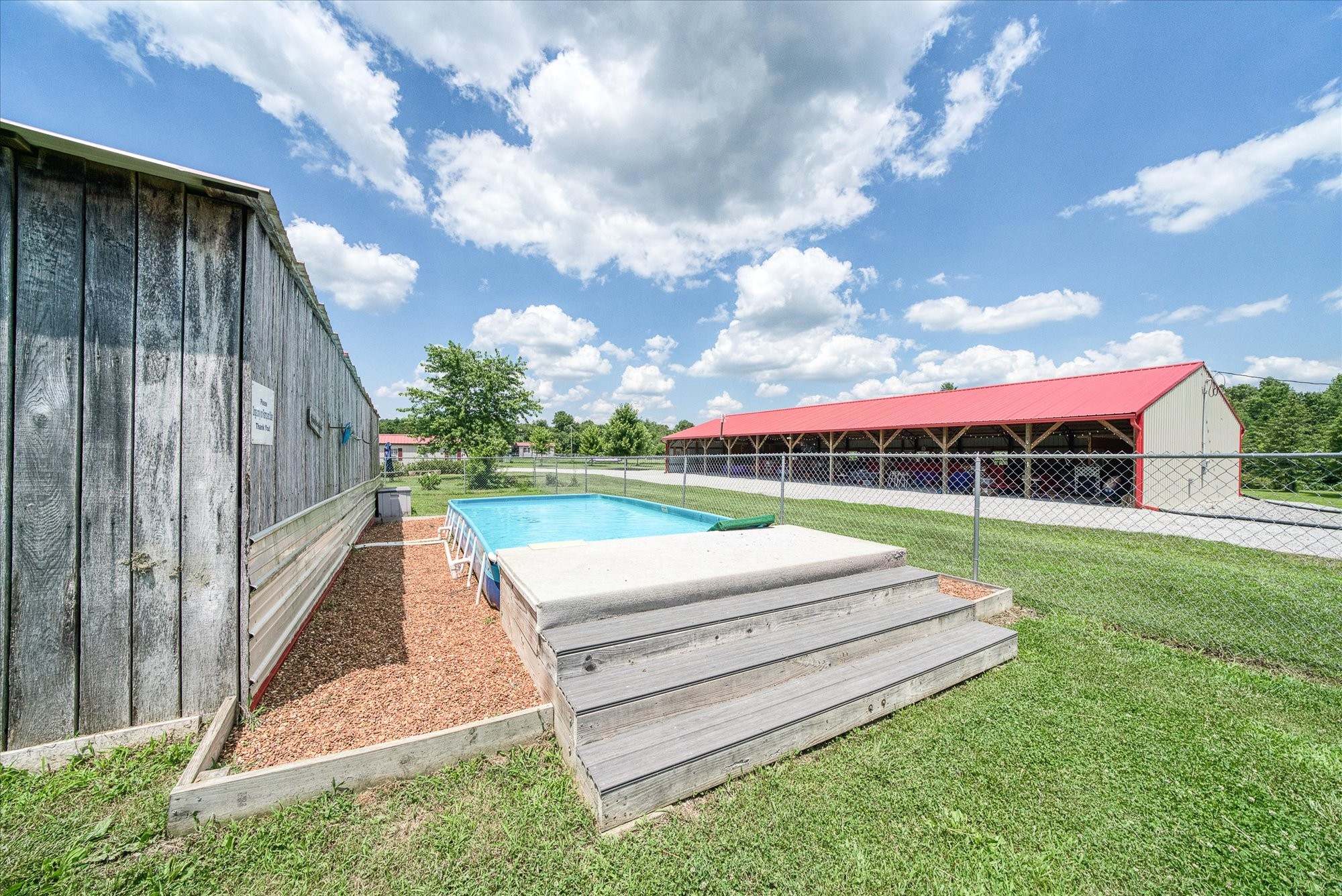 125 Clarence Lee Road Lancing, TN 37770 - Photo 26 of 55 a view of a yard with wooden fence