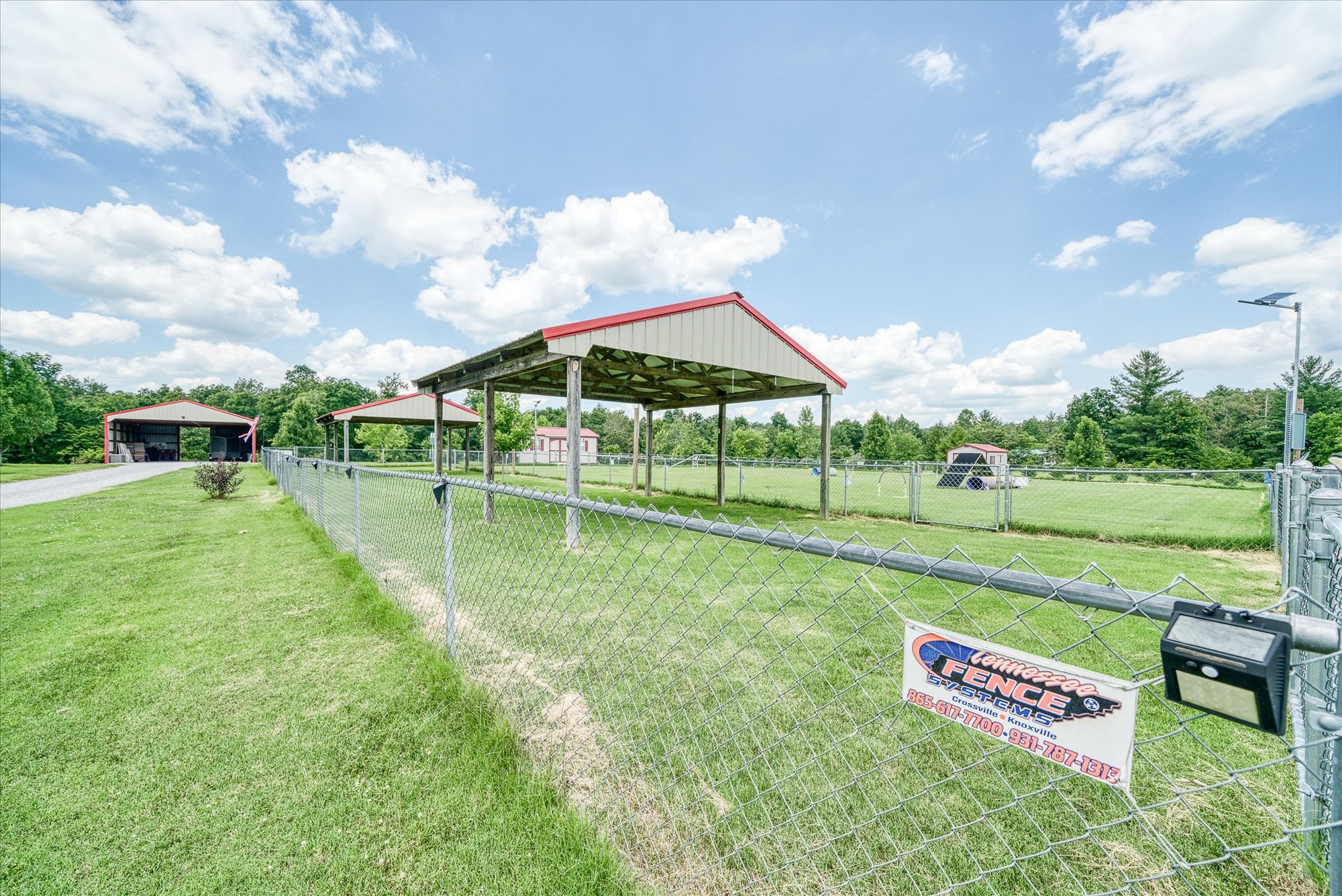125 Clarence Lee Road Lancing, TN 37770 - Photo 36 of 55 a view of a park with large trees and a big yard