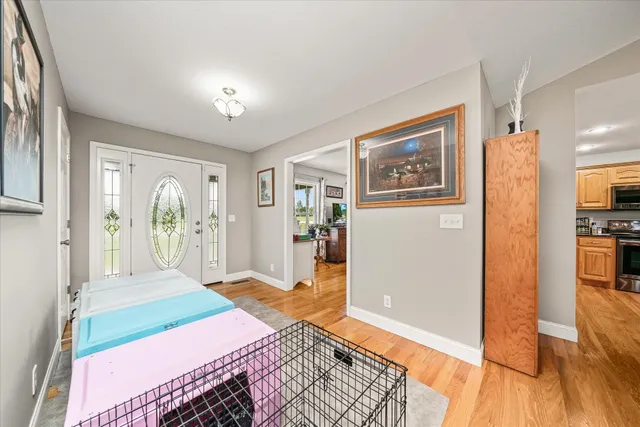 a bedroom with a bed and a view of bathroom