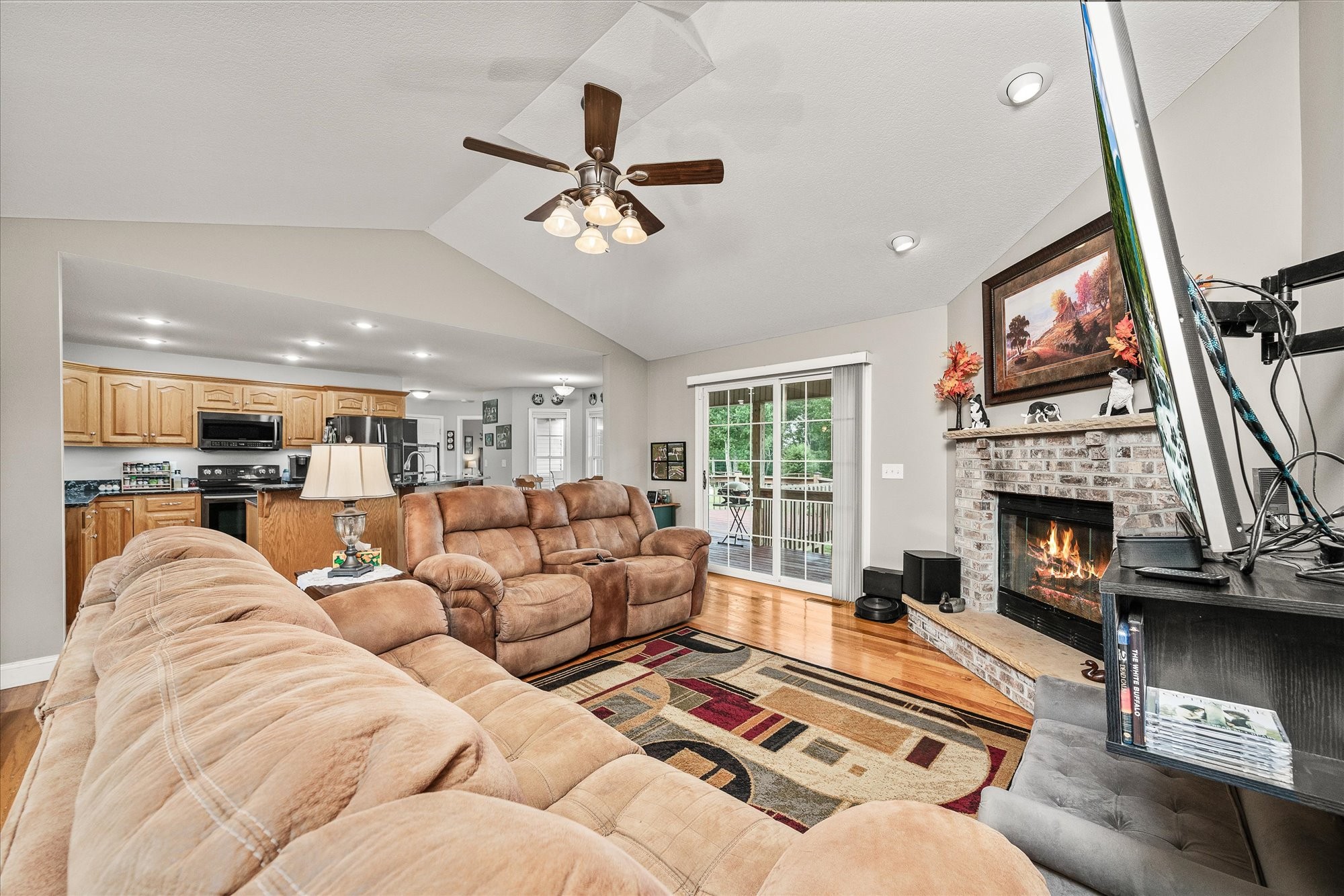125 Clarence Lee Road Lancing, TN 37770 - Photo 5 of 55 a living room with furniture and a fireplace