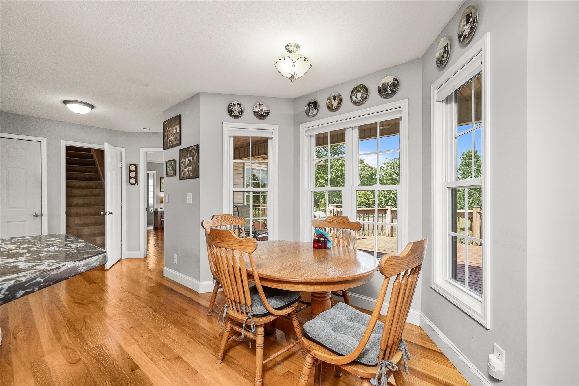 125 Clarence Lee Road Lancing, TN 37770 - Photo 9 of 55 a view of a dining room with furniture window and outside view