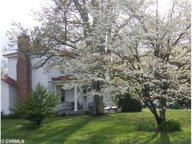 4974 Tabscott Road Kents Store, VA 23084 - Photo 1 of 11 a view of a building with a yard