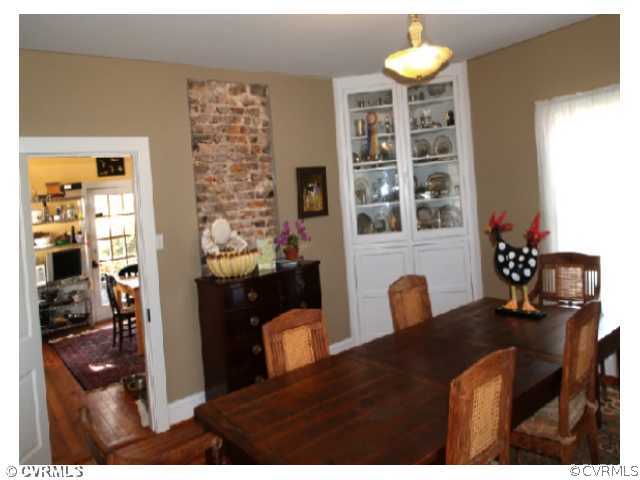 4974 Tabscott Road Kents Store, VA 23084 - Photo 4 of 11 a front view of a house with outdoor seating