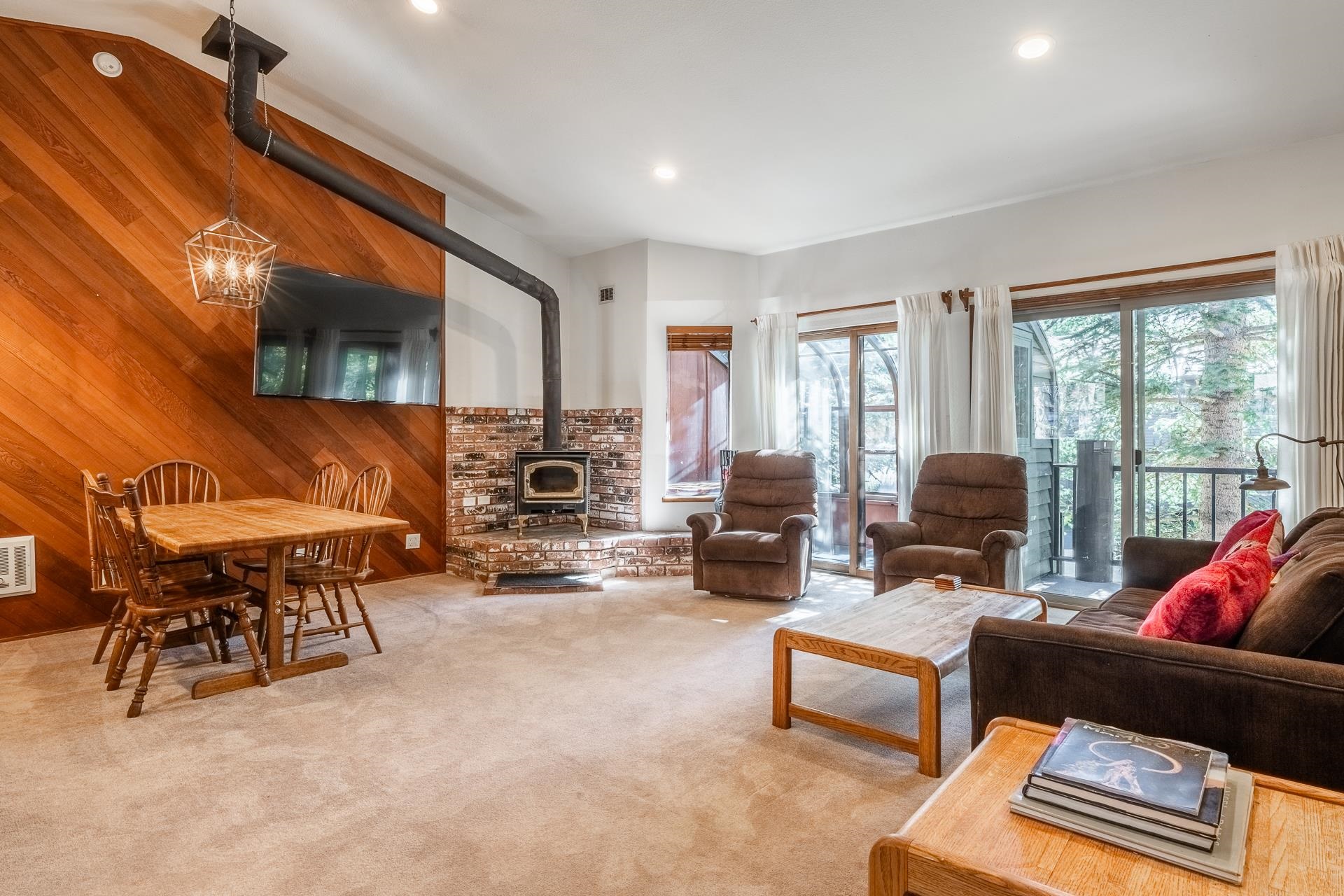 384 Joaquin Road, Unit 39 Mammoth Lakes, CA 93546 - Photo 1 of 35 a living room with furniture and a flat screen tv