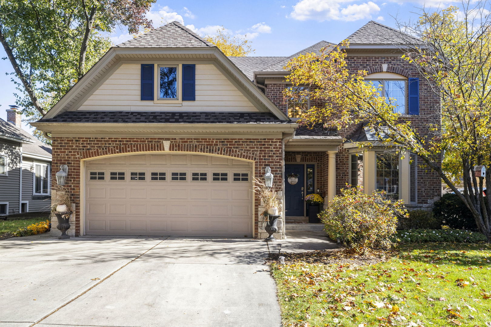 611 Fairfield Avenue Elmhurst, IL 60126 - Photo 1 of 44 a front view of a house with garden