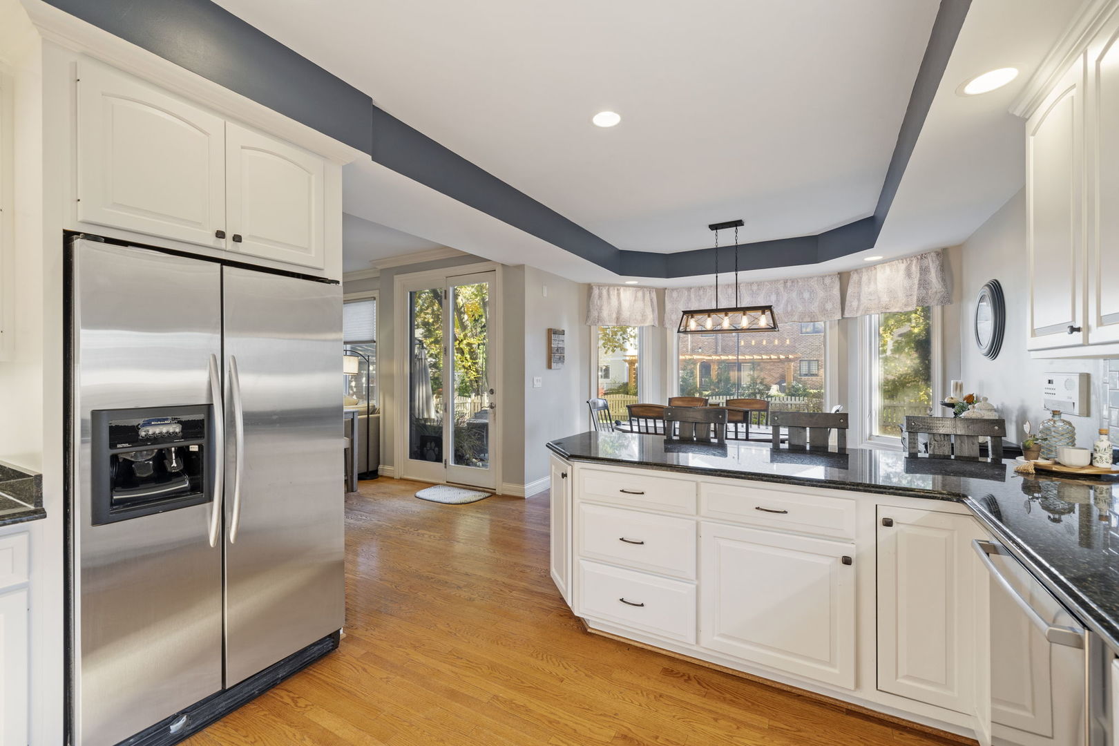 611 Fairfield Avenue Elmhurst, IL 60126 - Photo 13 of 44 a kitchen with granite countertop stainless steel appliances a refrigerator a sink a counter space and cabinets