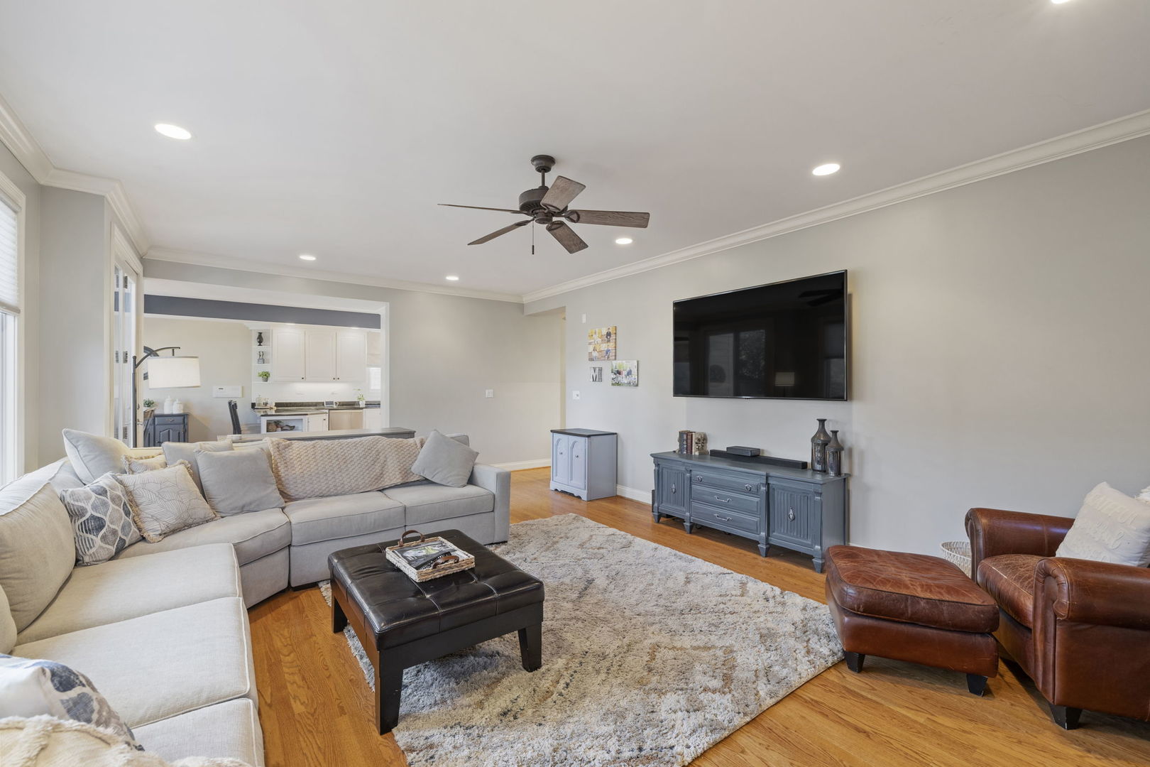 611 Fairfield Avenue Elmhurst, IL 60126 - Photo 16 of 44 a living room with furniture and a flat screen tv