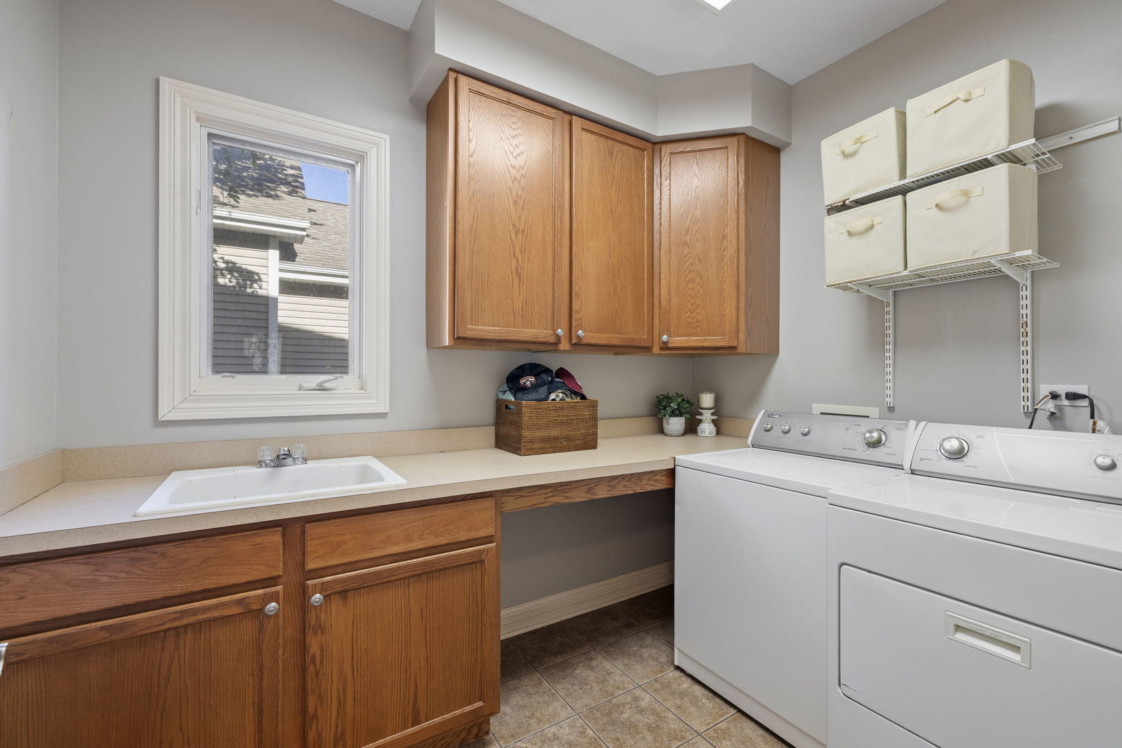 611 Fairfield Avenue Elmhurst, IL 60126 - Photo 18 of 44 a kitchen with a sink cabinets and window