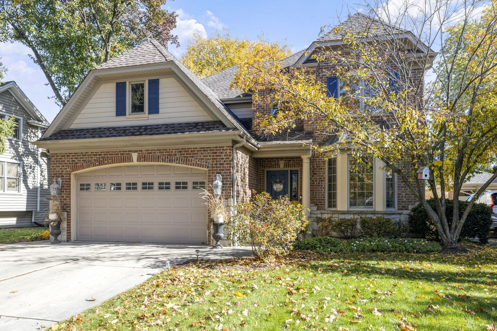 611 Fairfield Avenue Elmhurst, IL 60126 - Photo 2 of 44 a front view of a house with a yard