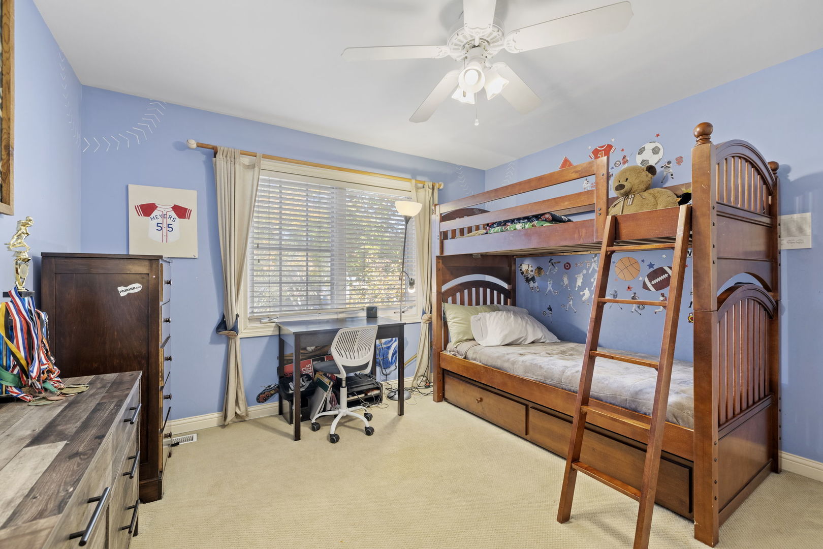 611 Fairfield Avenue Elmhurst, IL 60126 - Photo 29 of 44 a bedroom with furniture and a flat screen tv