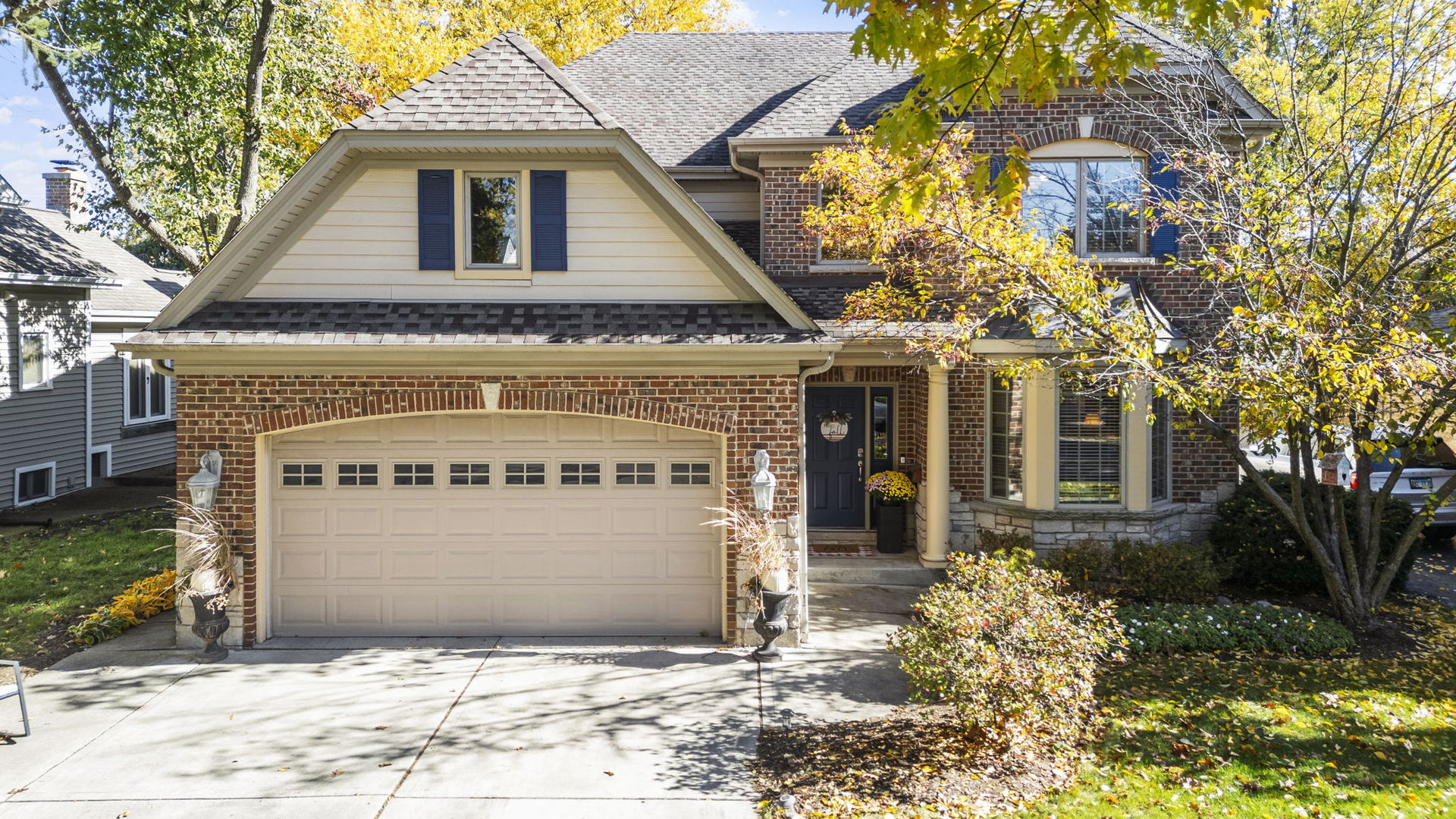 611 Fairfield Avenue Elmhurst, IL 60126 - Photo 3 of 44 a front view of a house with a yard
