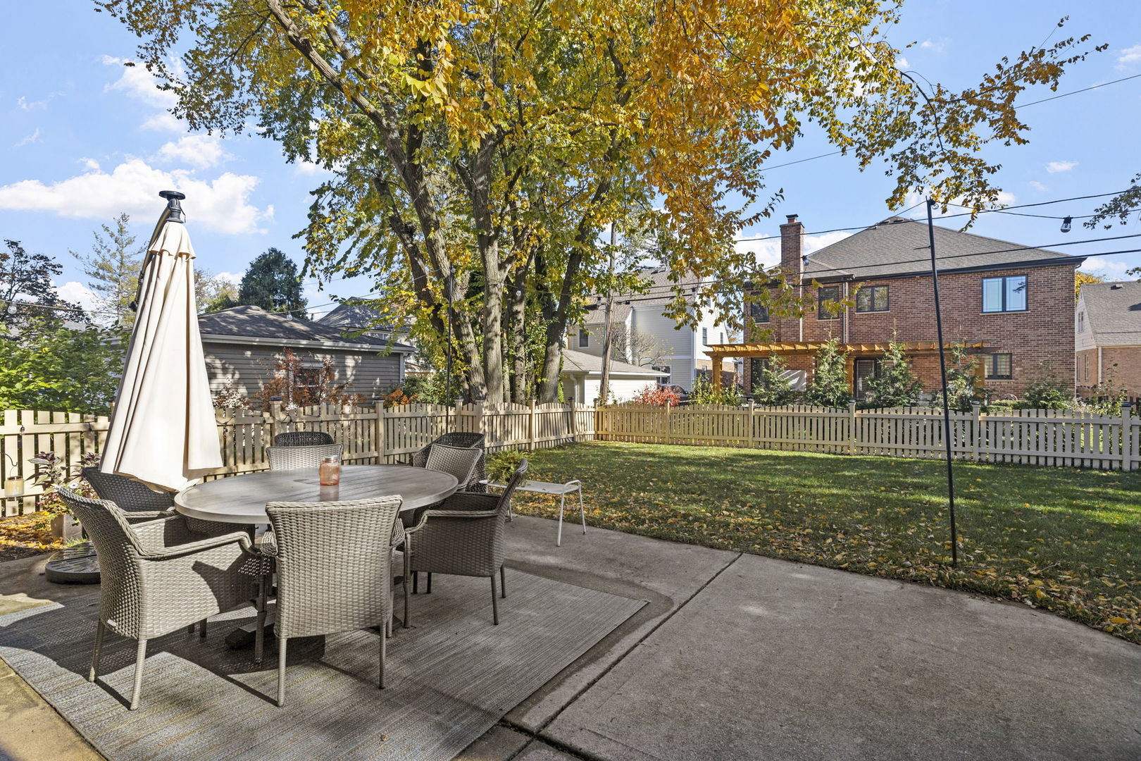 611 Fairfield Avenue Elmhurst, IL 60126 - Photo 35 of 44 a view of a house with backyard and a sitting area
