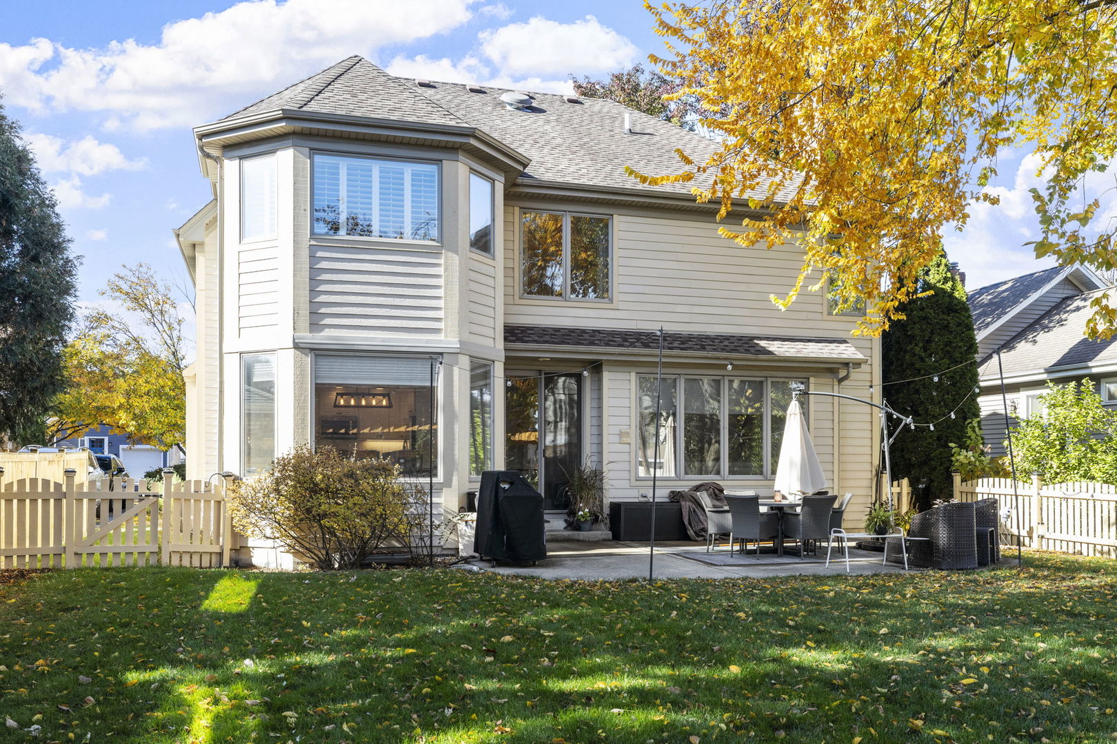 611 Fairfield Avenue Elmhurst, IL 60126 - Photo 37 of 44 a front view of a house with a yard table and chairs
