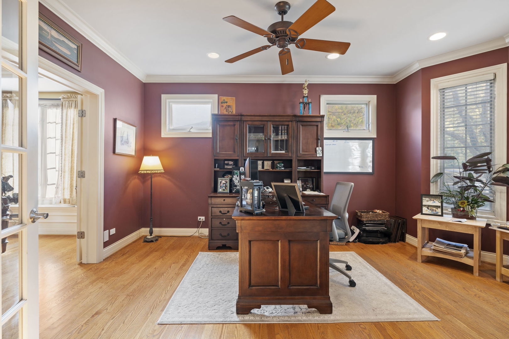 611 Fairfield Avenue Elmhurst, IL 60126 - Photo 7 of 44 a living room with furniture a window and a chandelier