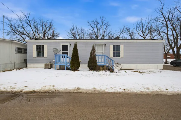a view of a yard covered in snow