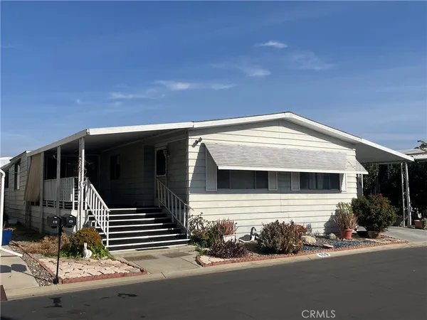 a front view of a house with a garage