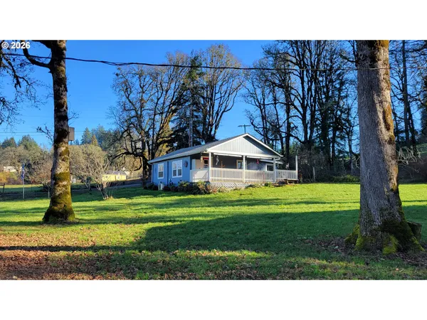 a outdoor living space with furniture and garden