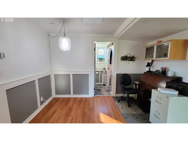a kitchen with sink and cabinets