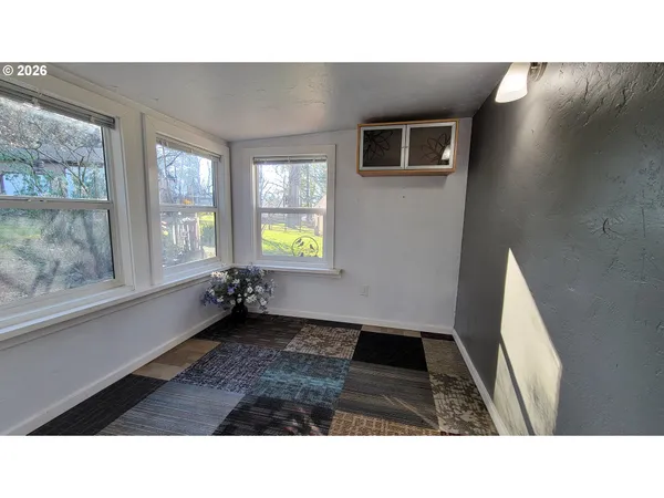 a black and white photo of a house