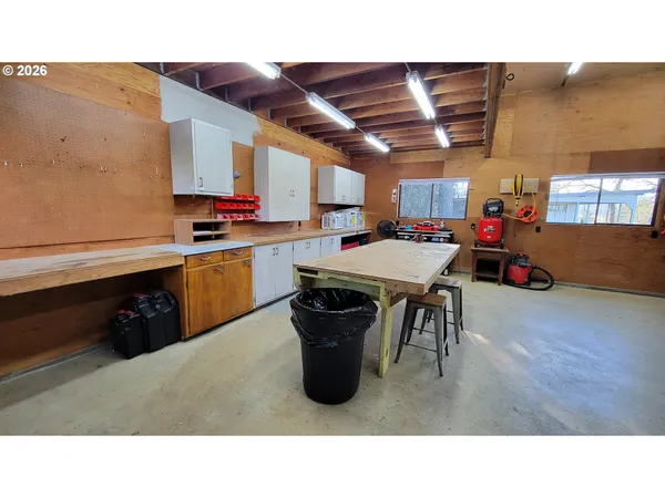 a room with lots of furniture and clutter