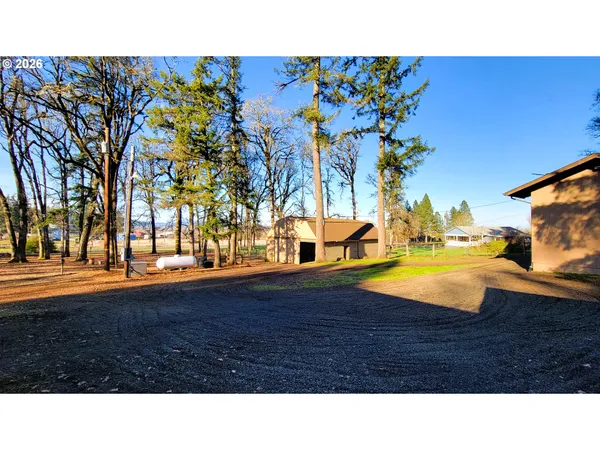 a garage room with lots of furniture