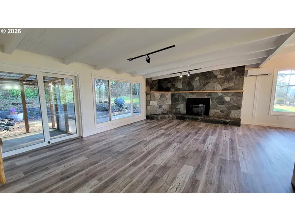 a bathroom with a sink a mirror and window