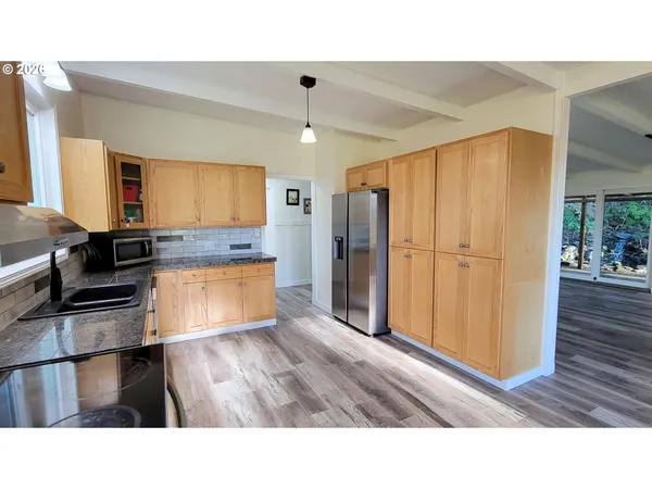 a room with a bed and a window