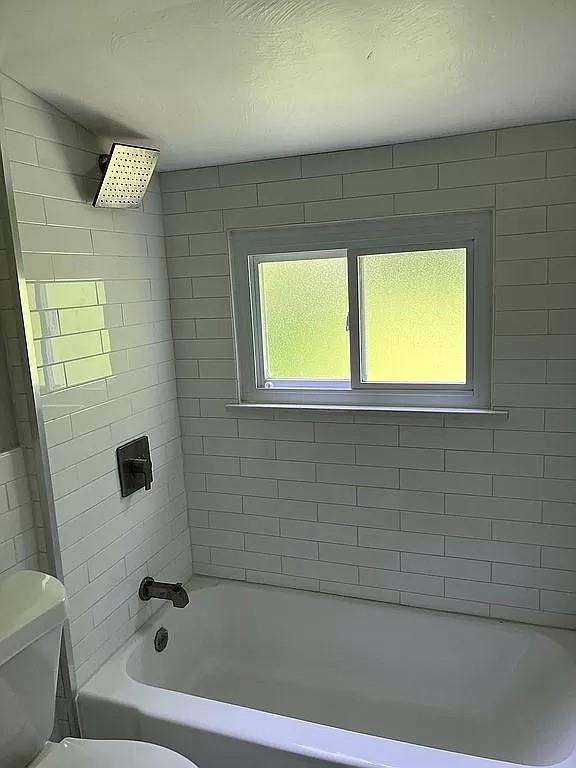 330 Beulah Road Pittsburgh, PA 15235 - Photo 15 of 24 a bathroom with a bathtub and next to a window