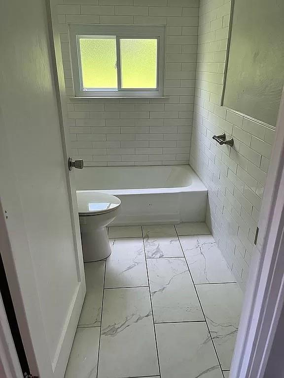 330 Beulah Road Pittsburgh, PA 15235 - Photo 17 of 24 a bathroom with a bathtub and a shower