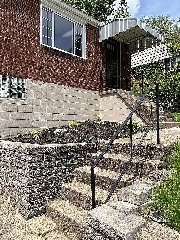 330 Beulah Road Pittsburgh, PA 15235 - Photo 3 of 24 a front view of a house with stairs