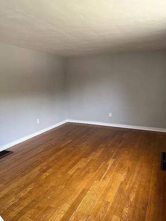 330 Beulah Road Pittsburgh, PA 15235 - Photo 6 of 24 a view of empty room with wooden floor