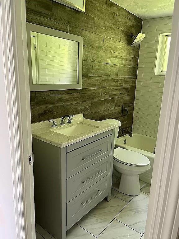 330 Beulah Road Pittsburgh, PA 15235 - Photo 10 of 24 a bathroom with a sink toilet and mirror