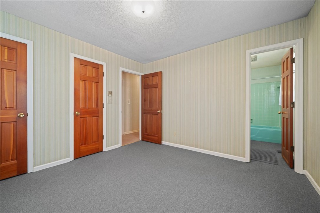 304 Shaw Road Honea Path, SC 29654 - Photo 24 of 39 This versatile room features warm wood doors and plush carpeting, offering comfort and style.